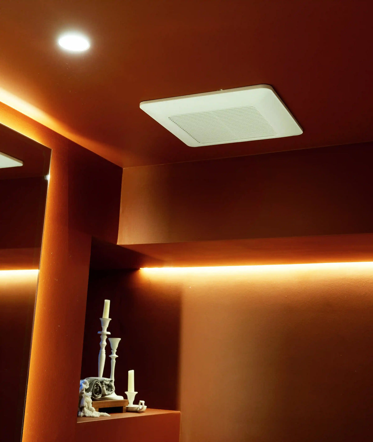 Before: exposed bathroom exhaust fan grille